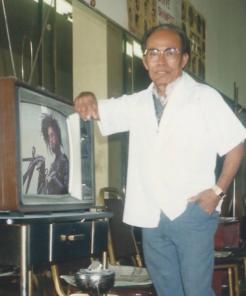 Artistic hand holding scissors